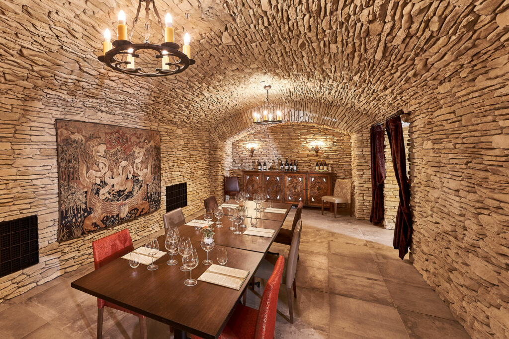 Inside of the Domaine Serene clubhouse wine cave dining room