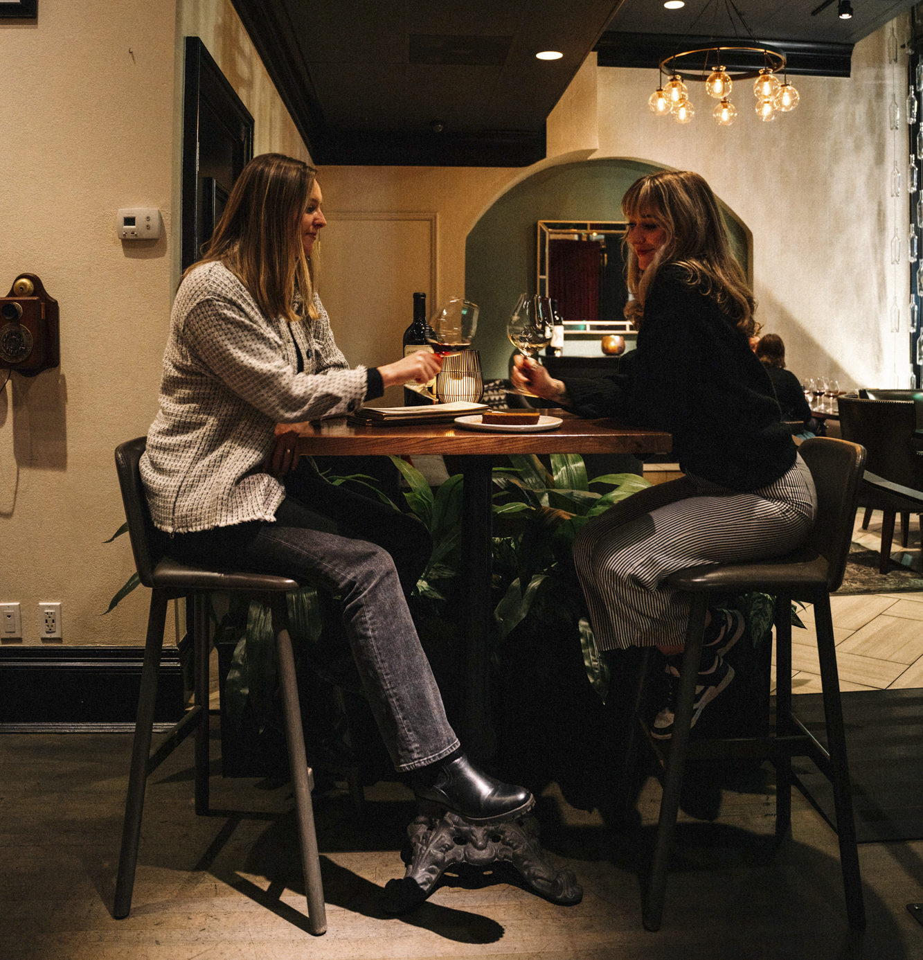 Women enjoying glasses of wine at Domaine Serene Wine Lounge Portland