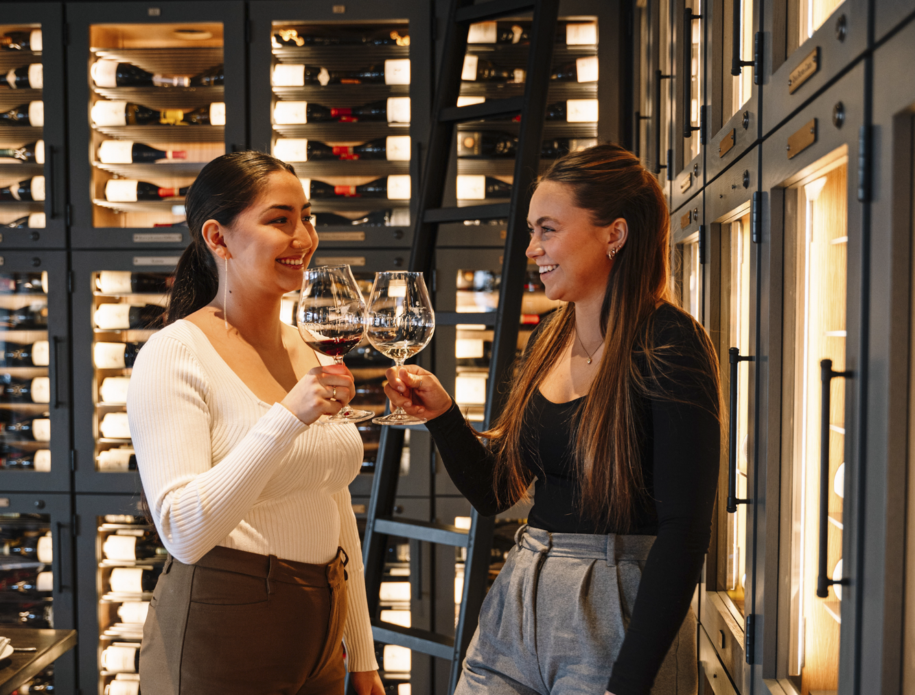 Women cheersing wine at Domaine Serene Wine Lounge Lake Oswego